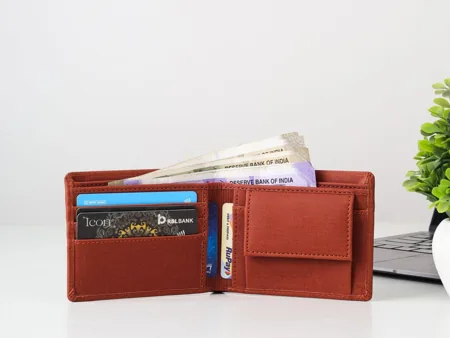 An open wallet with several cards in separate slots.